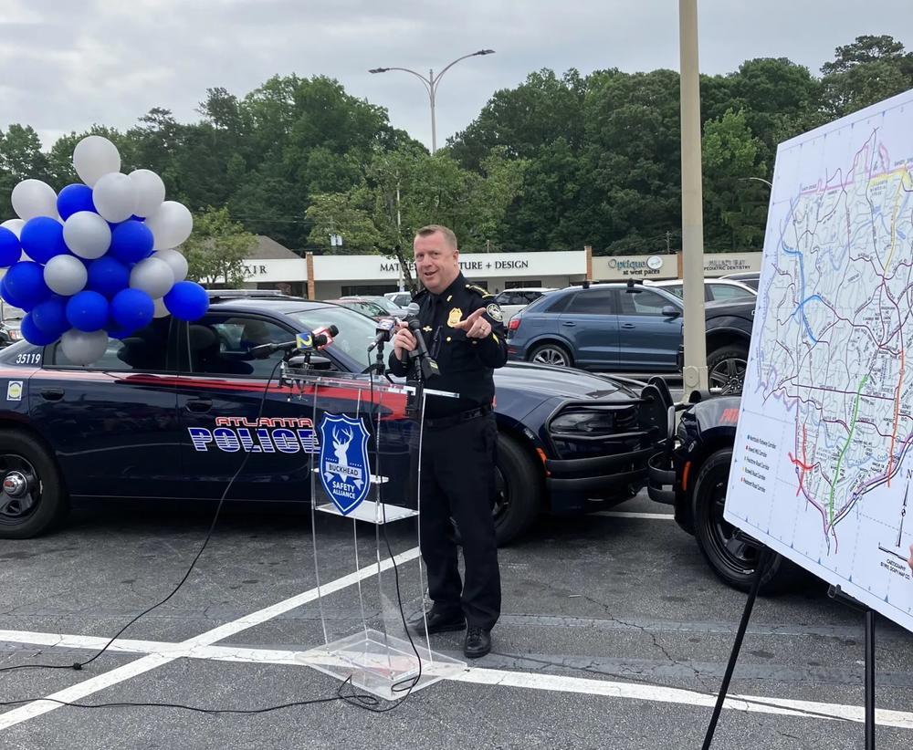 Atlanta Police Chief Darin Schierbaum points to a map showing where off-duty officers will be patrolling in Buckhead as part of the Buckhead Safety Alliance plan. (Dyana Bagby)