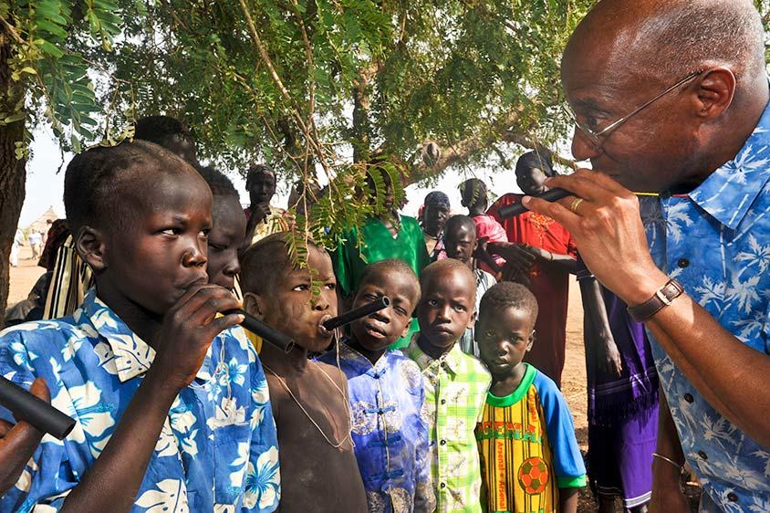 Donald Hopkins with South Sudanese kids.