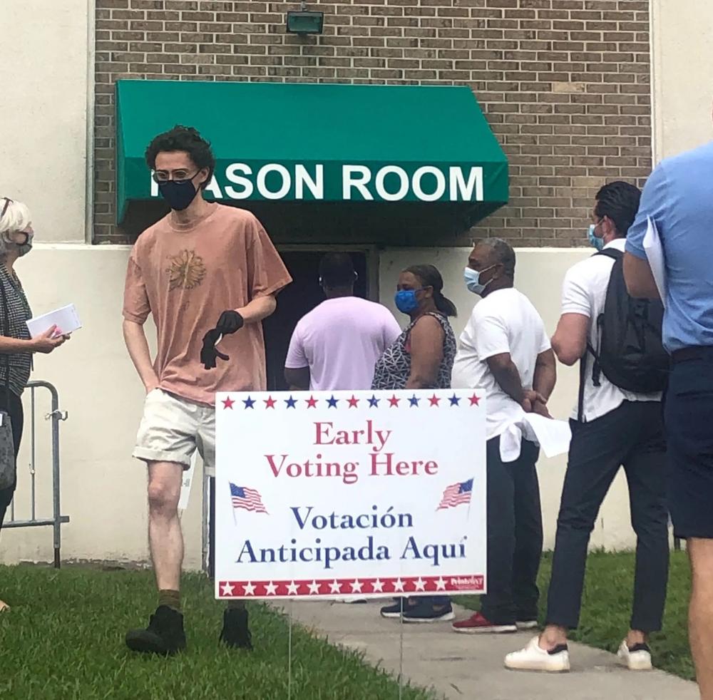 Voters wait in line at the Savannah Civic Center on the first day of early voting for the November 2020 General Election. Credit: Margaret Coker/The Current