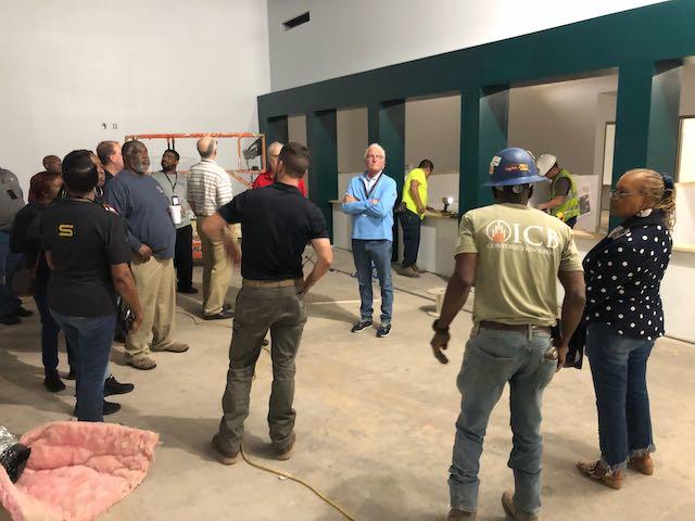 Macon-Bibb Board of Elections members and staff take a look at the new office inside the lower level of the old Sears at Macon Mall.