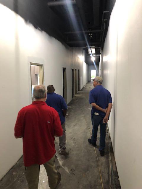 A hallway from the old Sears loading dock leads to storage rooms for the Board of Elections at Macon Mall. 