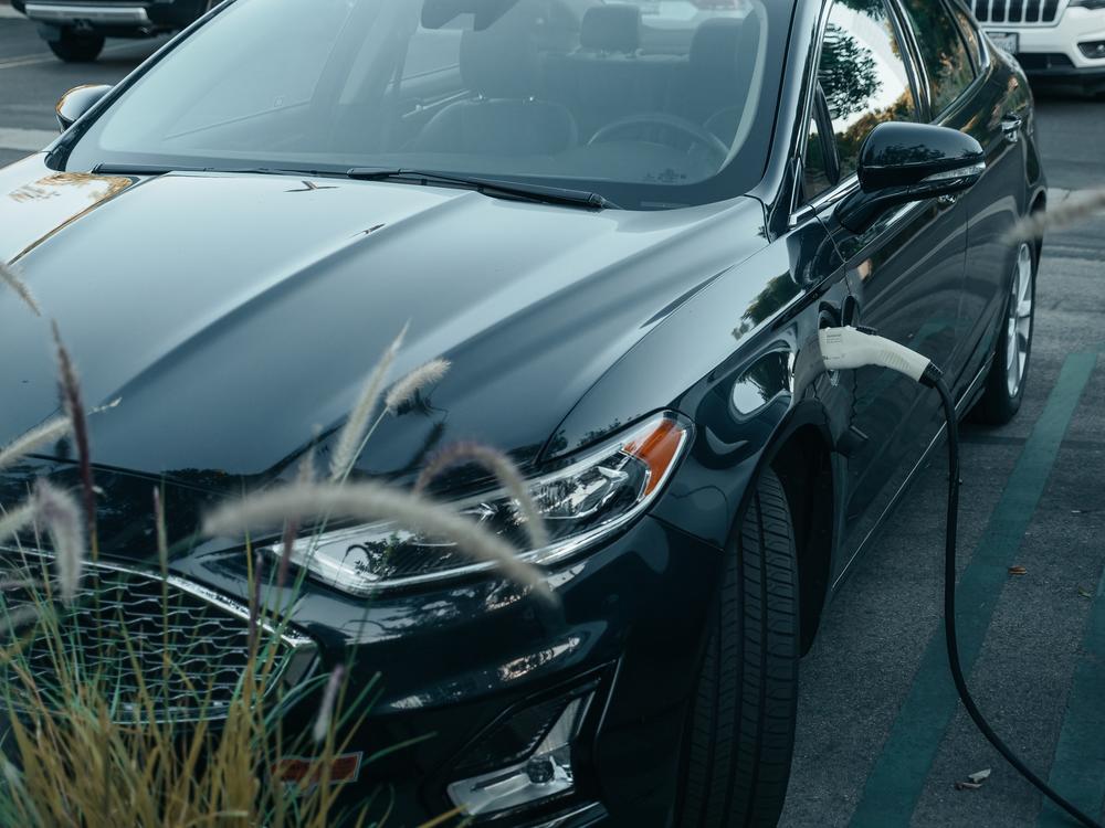 An EV is seen charging