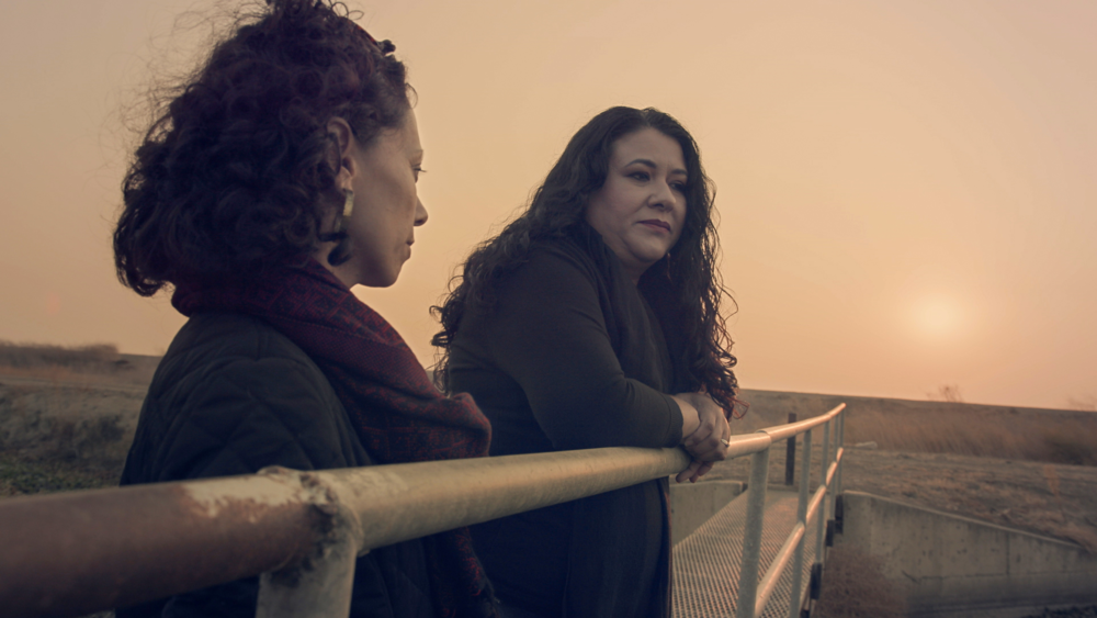 Jasmin Mara López looking out with her cousin.