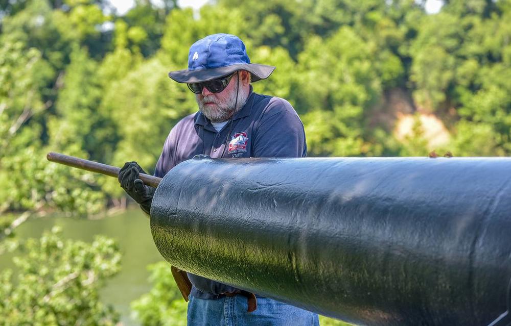 Jeff Seymour prepares a naval cannon for firing during the 2020 RiverBlast Festival at the National Civil War Naval Museum on July 4. Darrell Roaden Special to the Ledger-Enquirer 