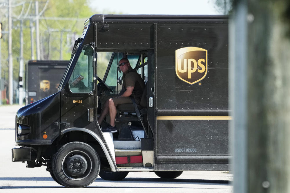 A UPS truck makes deliveries in Northbrook, Ill., Wednesday, May 10, 2023. Unionized UPS workers voted overwhelmingly on Friday, June 16, to authorize a strike, setting the stage for a potential work stoppage if the package delivery company and Teamsters can’t come to an agreement before their contract expires next month.