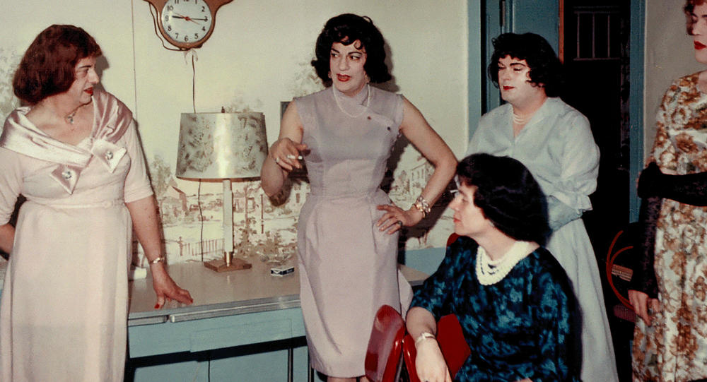 Susanna (center) and four guests in Casa Susanna's living room. Circa 1962. 