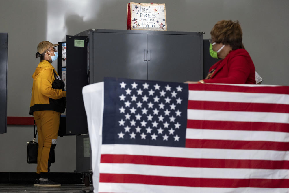 A voter marks her ballot during the first day of early voting in Atlanta on Oct. 17, 2022. Elected leaders in Georgia's most populous county — a Democratic stronghold — on Wednesday, June 7, 2023, rejected a Republican nominee for the county elections board who had challenged the eligibility of thousands of voters. 