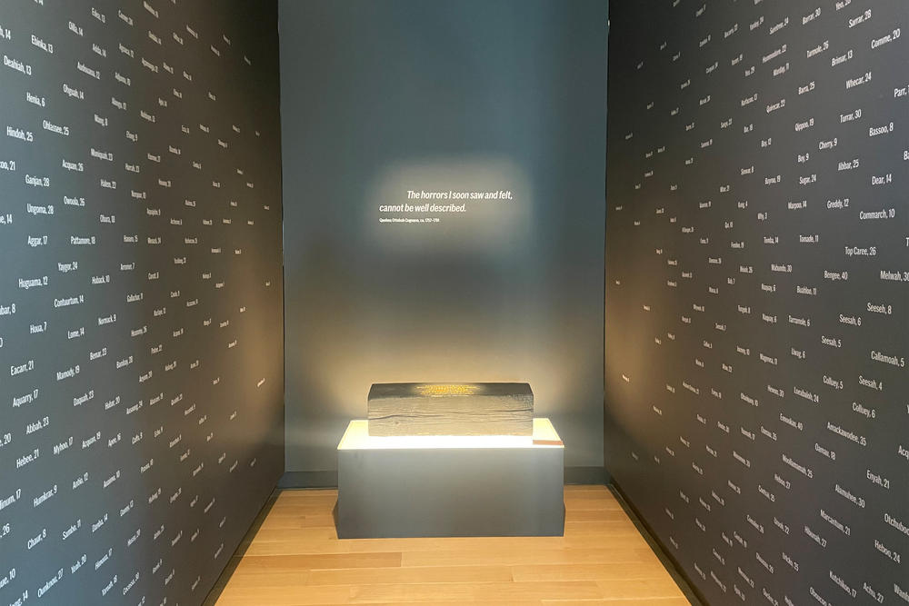 One exhibit inside the new International African American Museum in Charleston, South Carolina, features the names and ages of enslaved Africans who were captured and shipped to America during the trans-Atlantic slave trade — many of the children.