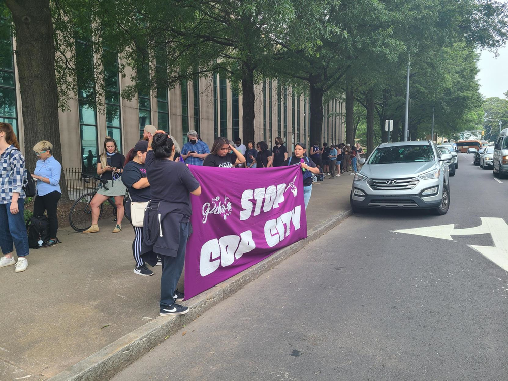 Protesters gathered, lined up and created banners in front of Atlanta City Hall on June 5, 2023 as Atlanta City Council holds a period of public comment and votes on funding for the proposed police training facility.