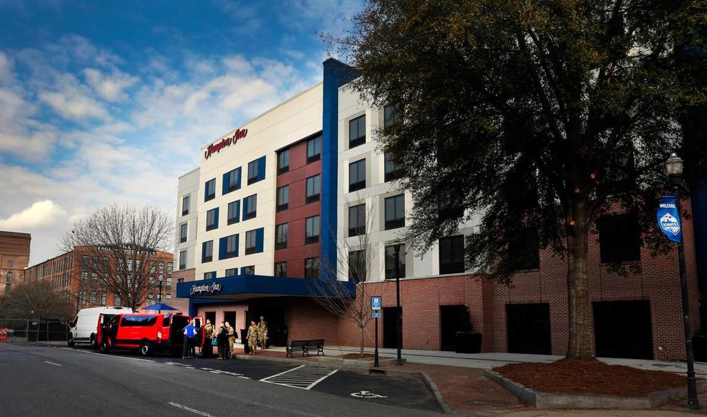 A new Hampton Inn at the corner of 12th Street and Broadway in downtown Columbus, Ga., is now open for business.