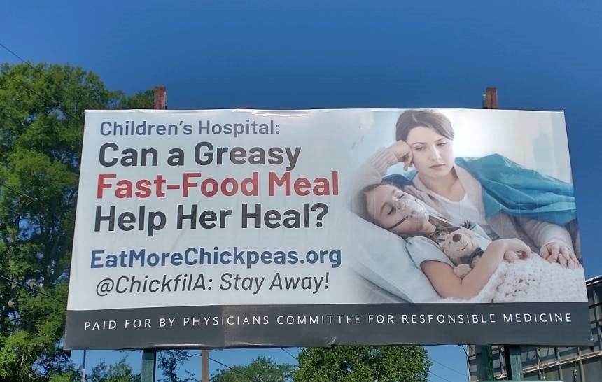 A billboard opposing a Chick-fil-A in Children's Hospital of Georgia
