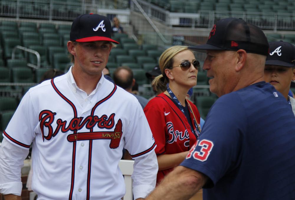 Hurston Waldrep (left) meets Braves manager Brian Snitker, July 15, 2023.