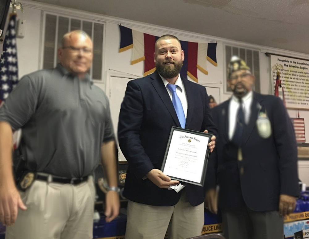 James T. Cassada (center), a former Glynn County Police drug investigator, was allowed to end his probation six years early, after he pleaded guilty in 2019 to having sexual relationships with informants.