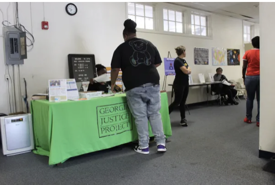 A Brunswick resident begins process of expunging his criminal record at a clinic at the Risely School on Albany Street on Saturday, Nov. 12, 2022.