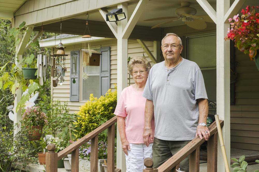 Sally and Don Garrett on their porch.