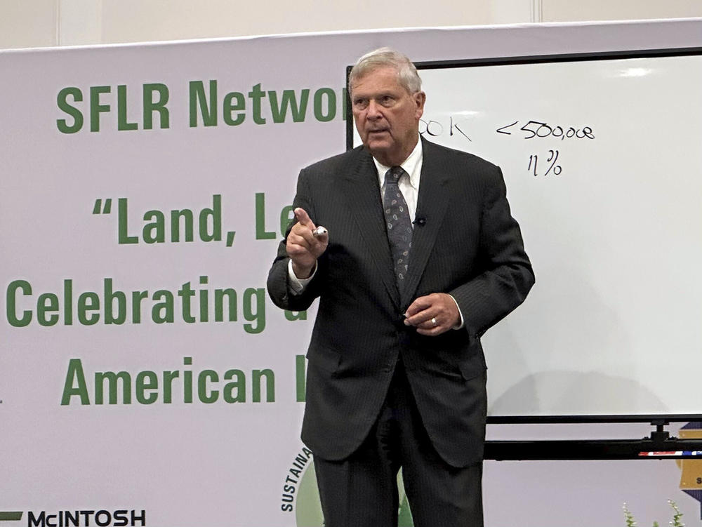 U.S. Agriculture Secretary Tom Vilsack speaks to a conference of Black forestland owners in Brunswick, Ga., on Tuesday, Aug. 22, 2023. Vilsack announced a new Biden administration program that will spend $150 million to help owners of small parcels of forestland partner with companies willing to pay them for carbon offsets and other environmental credits. 