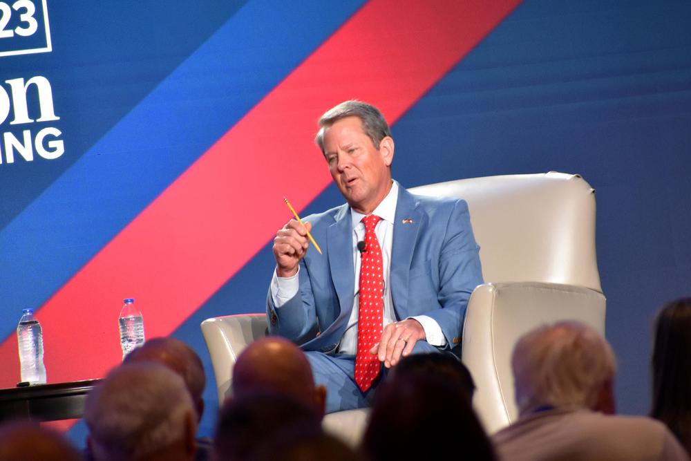 Gov. Brian Kemp speaks at The Gathering, a conservative conference in Atlanta.