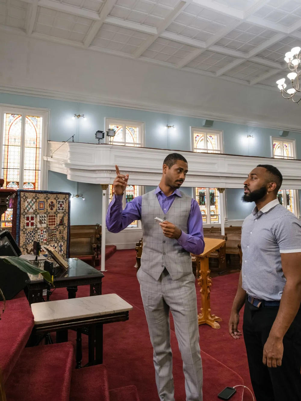 Anthony Kinslow, left, discusses an ongoing energy audit at First African Baptist Church with Engineering Intern Alphonse Houndegla. 