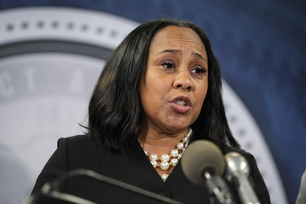 Fulton County District Attorney Fani Willis speaks in the Fulton County Government Center during a news conference, Monday, Aug. 14, 2023, in Atlanta. Donald Trump and several allies have been indicted in Georgia over efforts to overturn his 2020 election loss in the state.