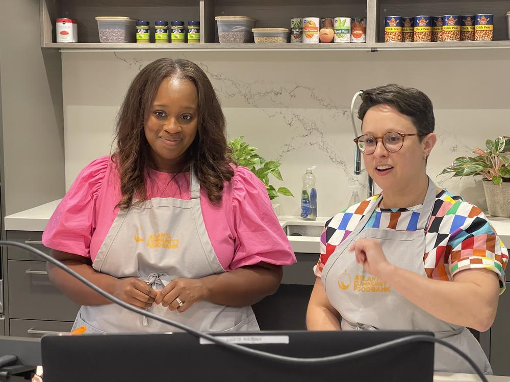 Leanna Pierre and Kristin Elliot speak to viewers during a live cooking show broadcast.