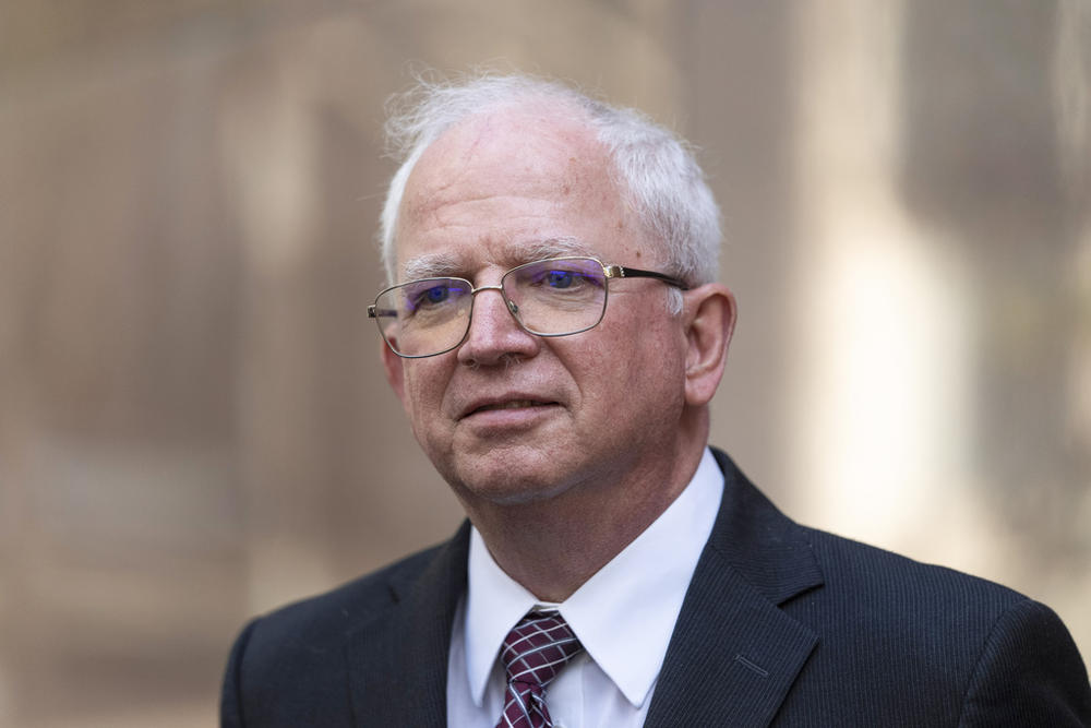 Attorney John Eastman, the architect of a legal strategy aimed at keeping former President Donald Trump in power, talks to reporters after a hearing in Los Angeles, June 20, 2023.