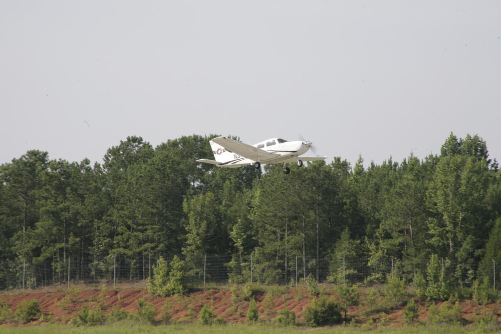A Cessna Skyhawk flies over LaGrange Callaway Airport during LaGrange College's Aviation Day event on July 19, 2023. Credit: LaGrange College