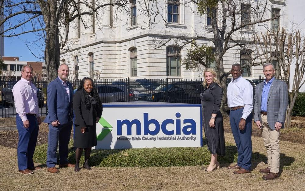 Current members serving on the Macon-Bibb County Industrial Authority pose for a group photo in front of their Mulberry Street office. From left to right, Chairman Robby Fountain, Mayor Lester Miller, Cassandra Washington, Ember Bentley, Ron Shipman and Dwight Jones. 