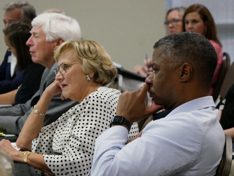 Rep. Butch Parrish (left), who is leading the House study committee, Rep. Sharon Cooper, who chairs the House Public Health Committee, and House Minority Leader James Beverly listen to a presentation Tuesday in Augusta.