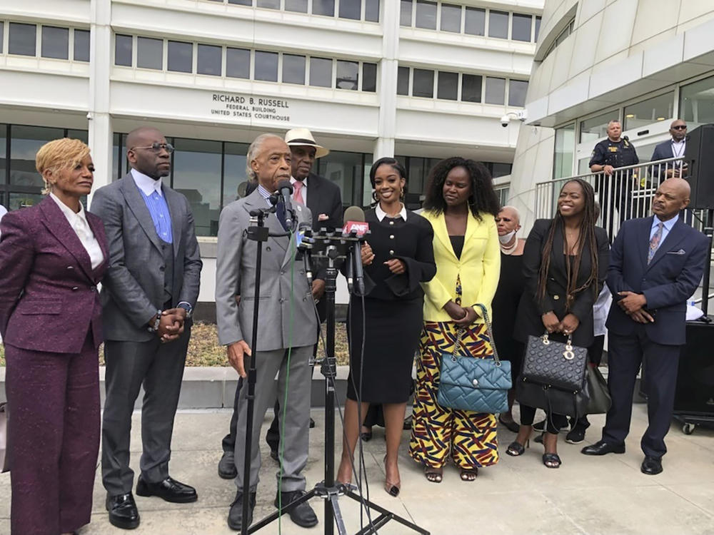 The Rev. Al Sharpton speaks outside the Richard B. Russell federal courthouse in Atlanta, on Tuesday, Sept. 26, 2023. To his left in the black dress is Fearless Fund CEO and co-founder Arian Simone. A judge Tuesday refused to block a grant program the fund administers for Black women entrepreneurs, saying a lawsuit arguing it illegally excluded other races was not likely to succeed.