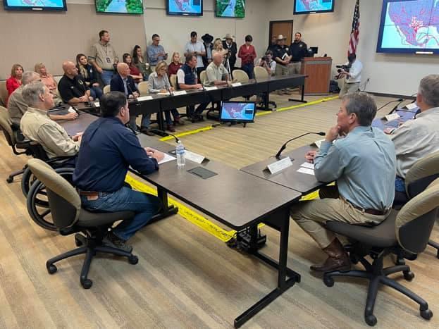 Gov. Brian Kemp (right foreground) attended a briefing on illegal immigration at the Texas border in 2021.