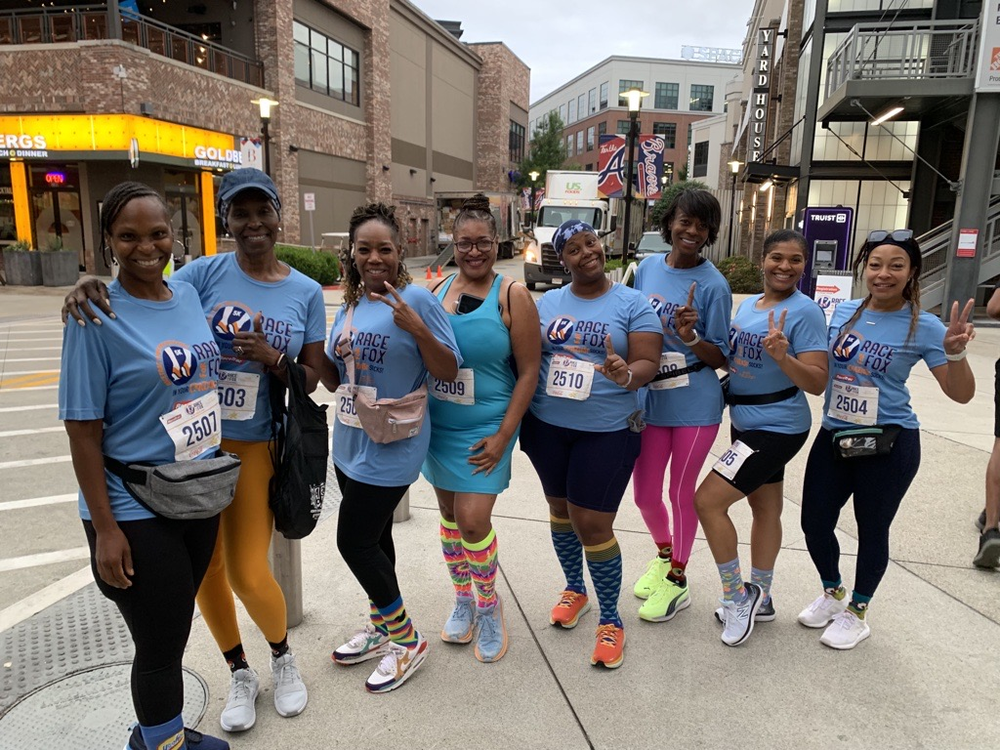 Jacqueline Pittman (second from right) says the 2023 RaceTrac Run for Research at Truist Park brought her fitness group (pictured) together around a common cause in fighting Parkinson’s Disease.  