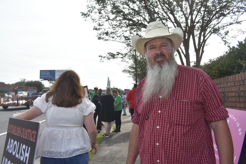Wendell Shrock runs security for Operation Save America’s protest in front of A Preferred Woman’s Health Center of Atlanta in July.