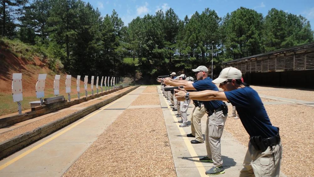 Recruits shooting at targets with training handguns at Georgia Public Safety Training Center’s shooting range. Credit: Georgia Public Safety Training Center