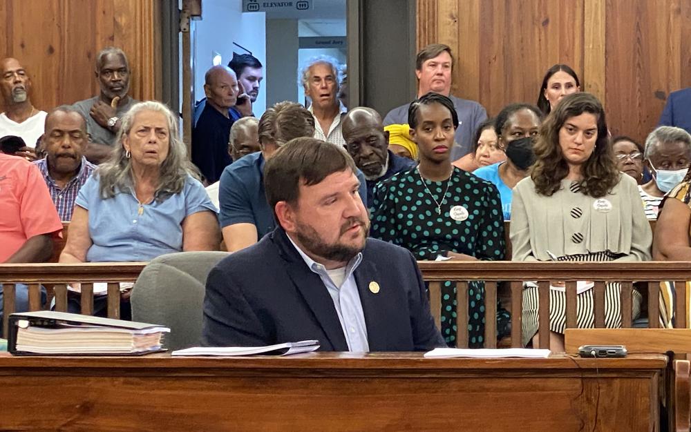 McIntosh County Manager Patrick Zoucks sits at a meeting of county commissioners at the McIntosh County Courthouse on Sept. 12, 2023.