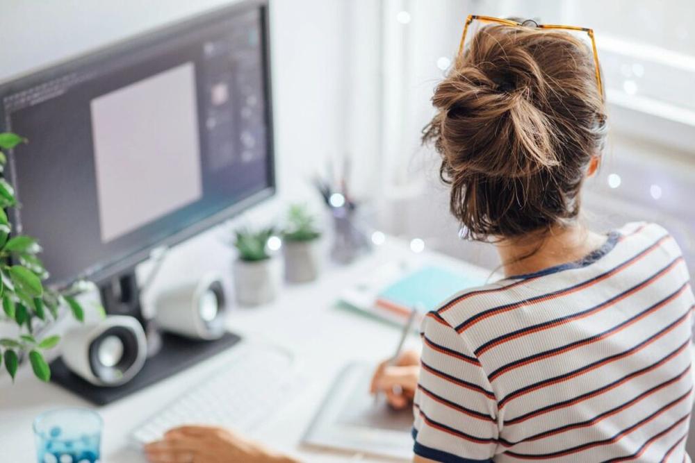 woman sitting at a desk