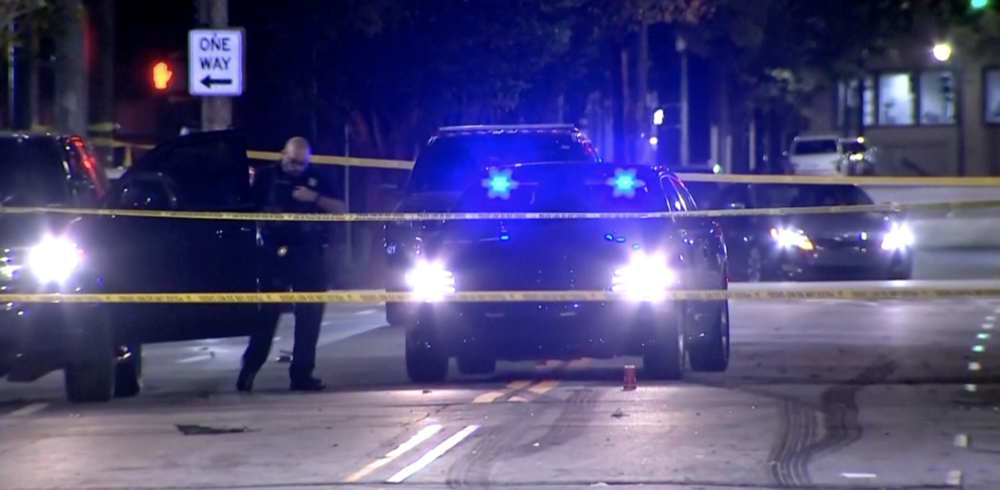 This image provided shows police on the scene of a shooting that left multiple people injured in downtown Atlanta early Sunday morning, Oct. 29, 2023. In a statement Sunday, university officials confirmed that two students were among those injured in the shooting. 