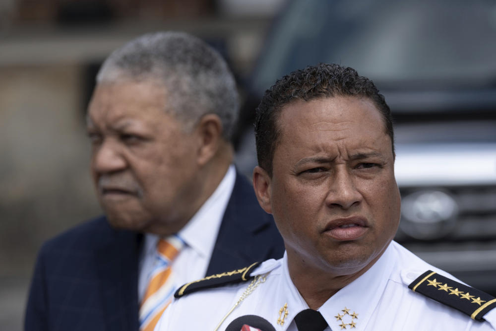 Fulton County, Ga., Sheriff Patrick Labat, center, speaks to the media, June 1, 2021 in Atlanta. An Alabama man has been indicted on federal charges that he threatened violence against the sheriff and Fulton County, Ga., District Attorney Fani Willis related to an investigation into former President Donald Trump. The indictment was returned Wednesday, Oct. 25, 2023, and unsealed Monday, Oct. 30. 