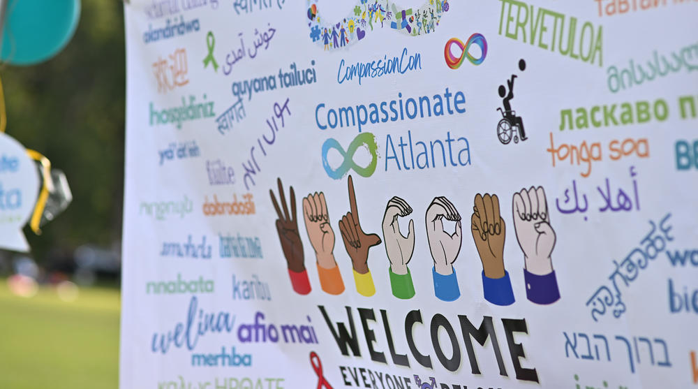 Welcome signing hands