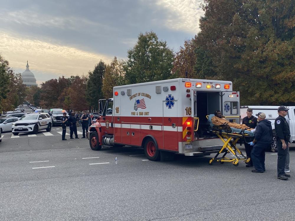 First responders load a suspect identified as Ahmir Lavon Merrell, 21, into an ambulance after U.S. Capitol Police used a taser on him and arrested him for allegedly carrying a semi-automatic firearm near the U.S. Capitol building on Tuesday, Nov. 7, 2023.