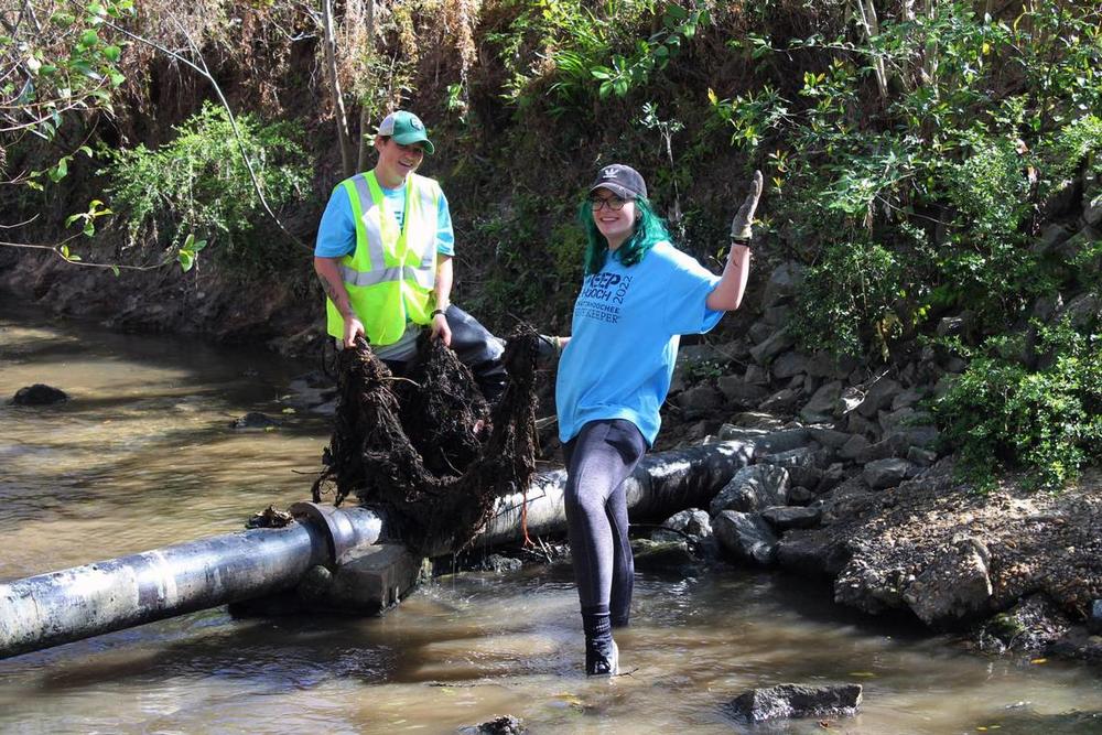 Glennis Desensi and Ashley Desensi clean up the Columbus tributary, Weracoba Creek, during “Sweep the Hooch” in 2022. Photo courtesy of Ashley Desensi  