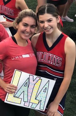 Lubin, left, with fellow cheerleader Layla McSorley.