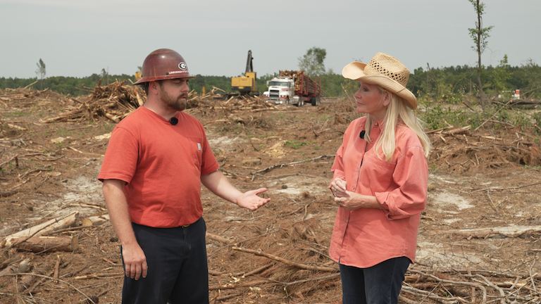 Georgia Outdoors host Sharon Collins at a logging site.