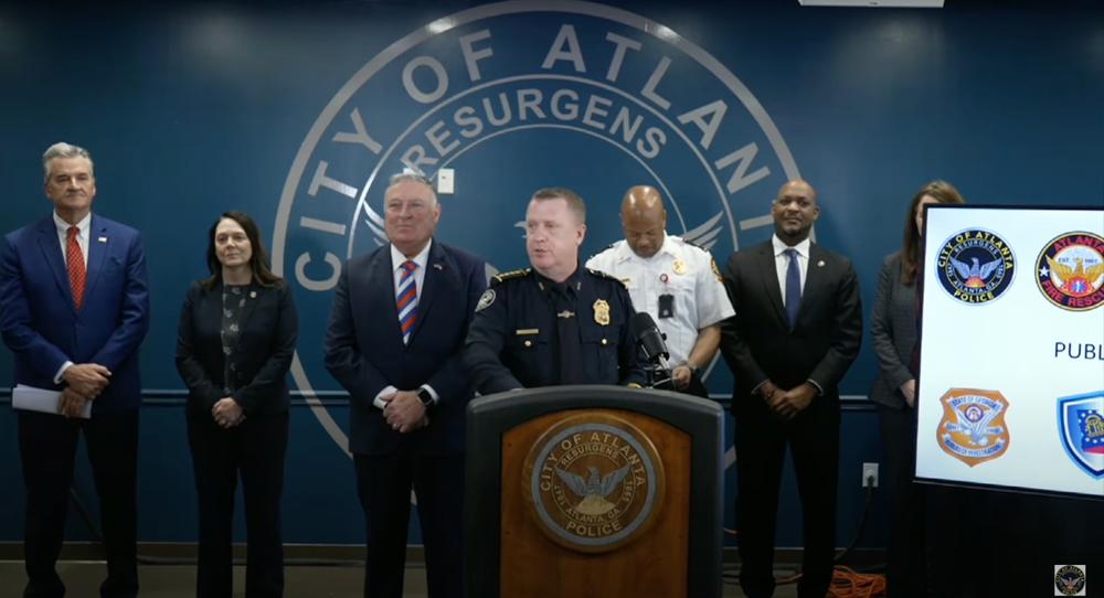 Atlanta Police Chief Darin Schierbaum, center, announced a $200,000 reward leading to the arrests and convictions of arson suspects allegedly protesting the construction of the city’s public safety training center. (Screen capture)