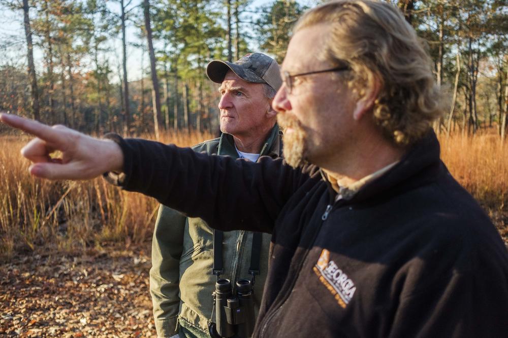 Retired Georgia DNR biologist Jim Ozier, left, and Nathan Klaus after the woodpecker release. 