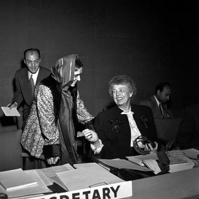 Women delegates from various countries played a key role in getting women’s rights included in the Declaration. Hansa Mehta of India (standing above Eleanor Roosevelt) is widely credited with changing the phrase "All men are born free and equal" to "All human beings are born free and equal" in Article 1 of the Universal Declaration of Human Rights.