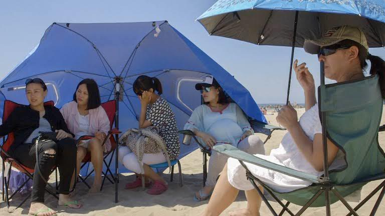 Expecting mothers at the beach.