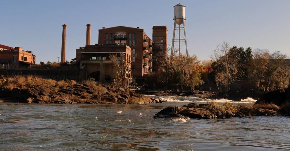 The old Eagle and Phenix mill, now apartments, from the Chattahoochee River. 
