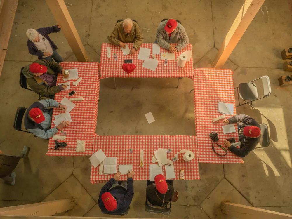 Judges taste and vote on the years best Brunswick stew. Credit: Justin Taylor/The Current