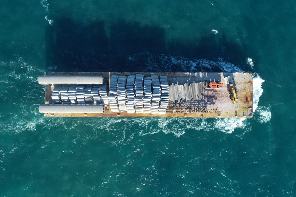 A barge carrying concrete materials and retired MARTA railcars to be placed at Artificial Reef L about 23 nautical miles east of Ossabaw Island on Thursday, Dec. 21, 2023. 