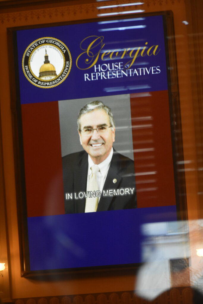 A screen in the House chamber memorializes Rep. Richard Smith. Ross Williams/Georgia Recorder